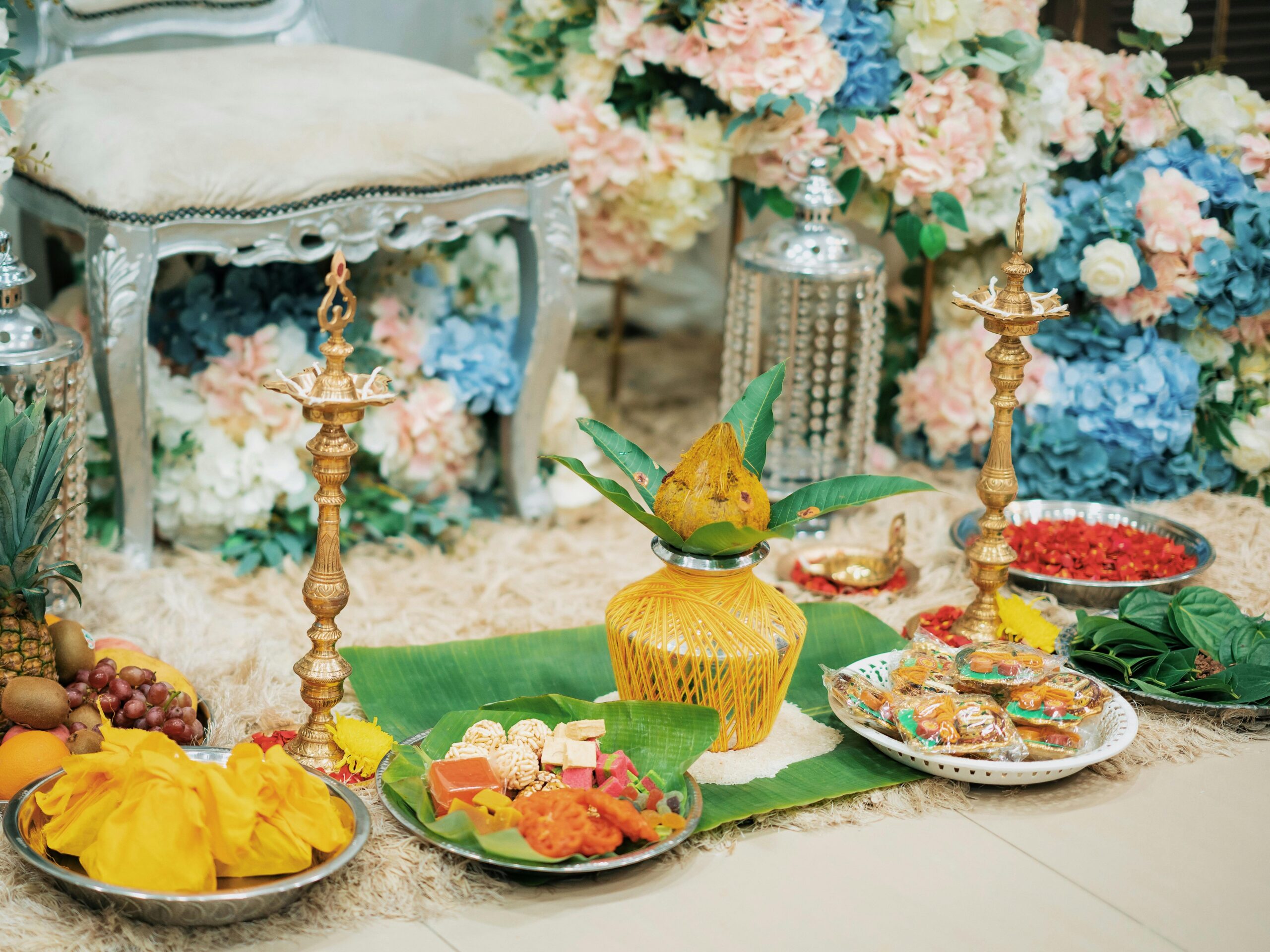 Indian ritual setup with traditional offerings and decorations for a cultural ceremony.